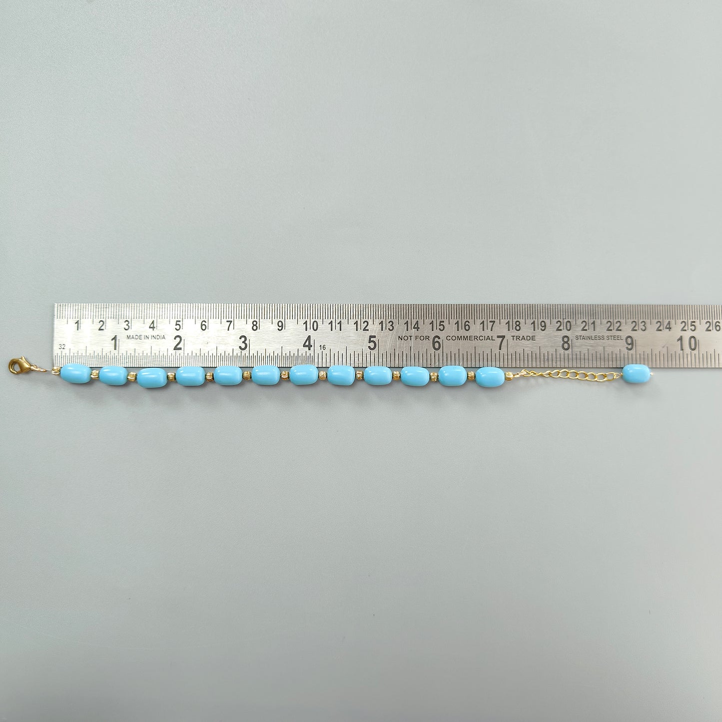 Blue Synthetic Turquoise Beads Bracelet: 63.20cts Simulant Turquoise Baguette Plain Brass Bracelet 11mm 7"