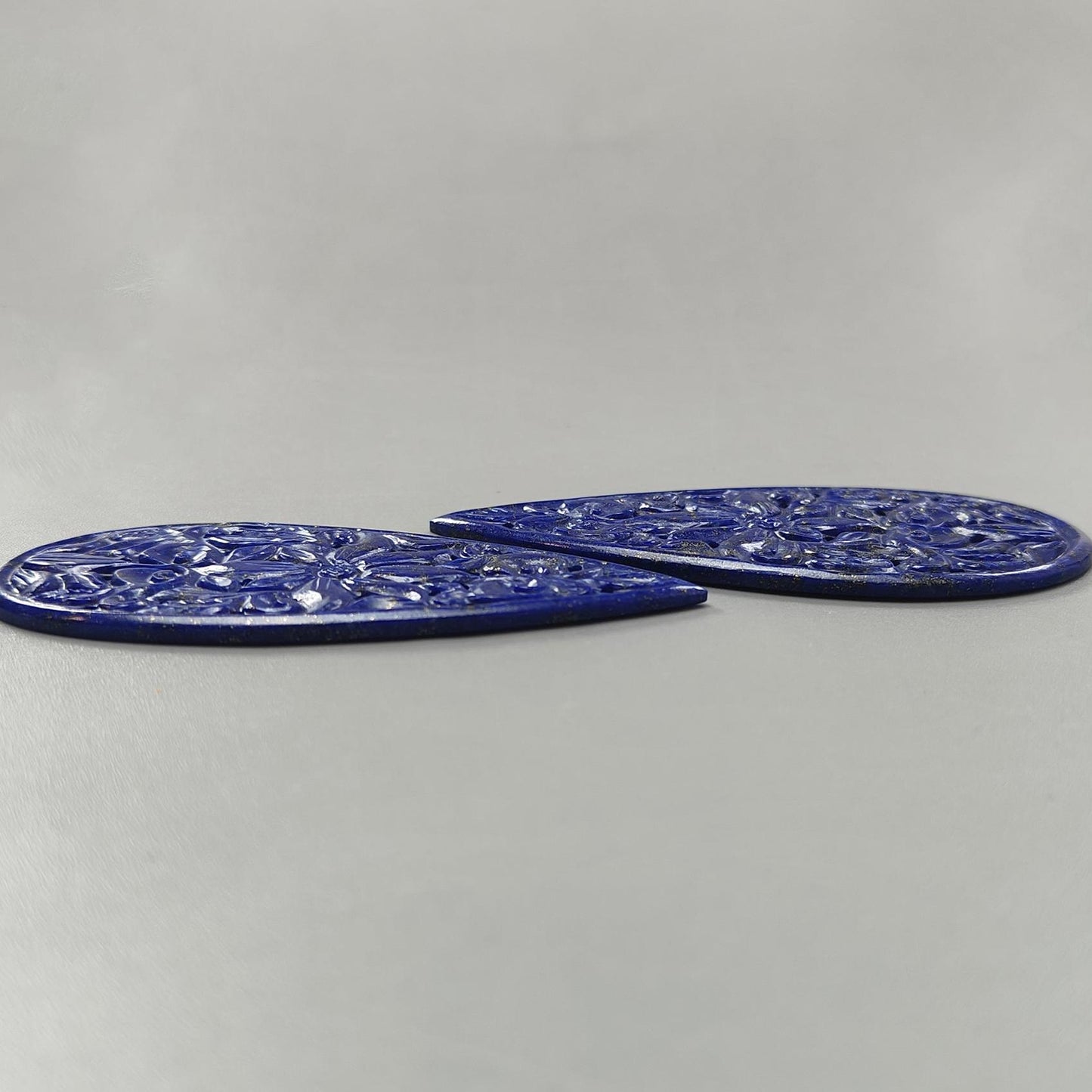 123.80cts Untreated Lapis Lazuli Hand Carved Pear Shape 76*32mm Pair