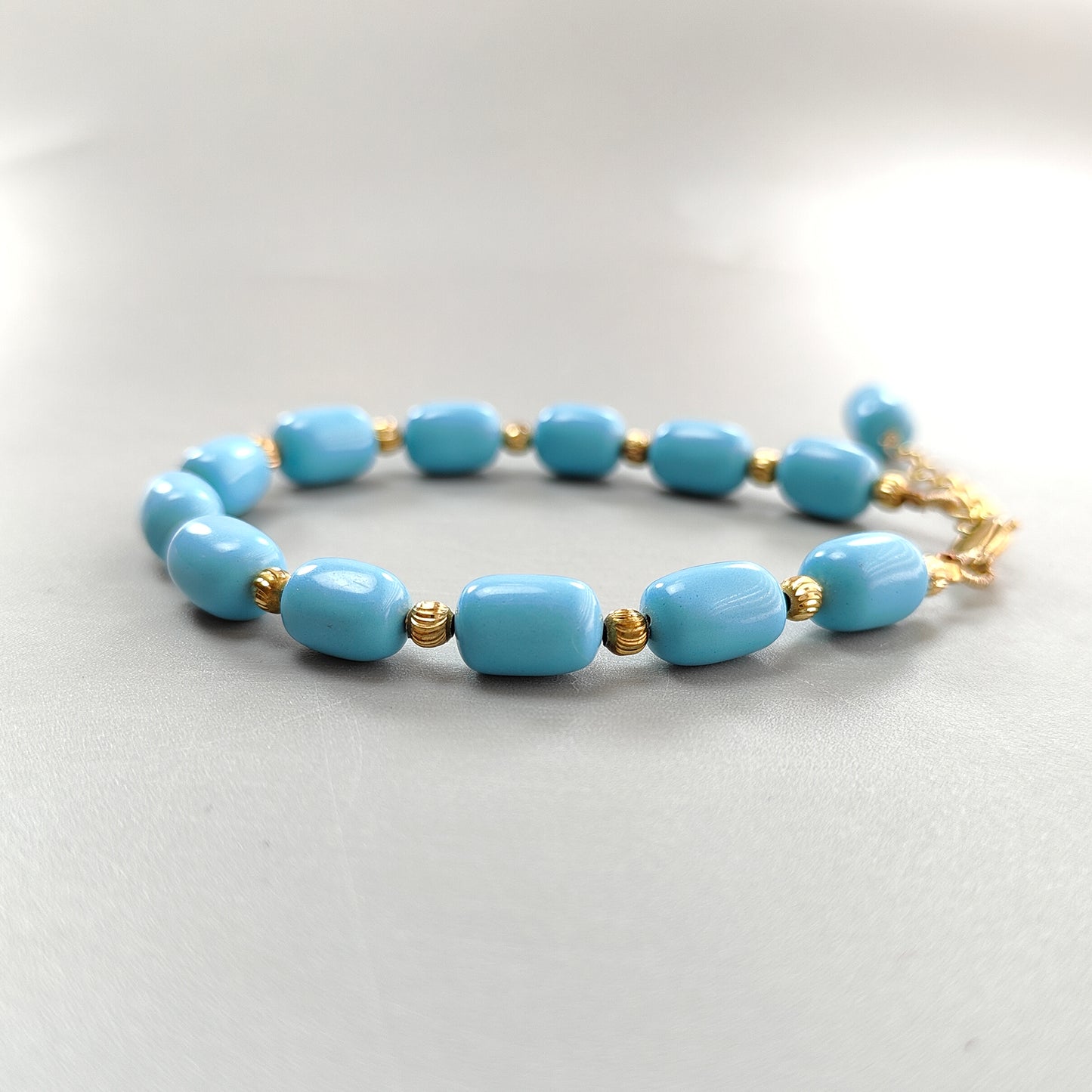 Blue Synthetic Turquoise Beads Bracelet: 64.00cts Simulant Turquoise Baguette Plain Brass Bracelet 12mm 7"