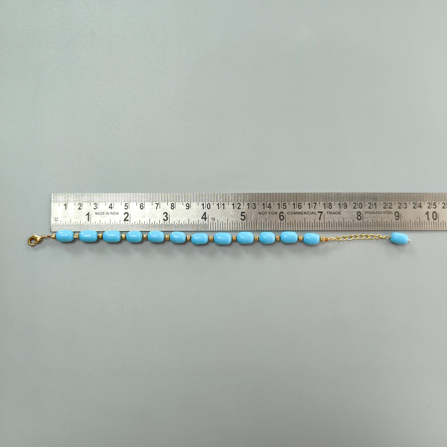 Blue Synthetic Turquoise Beads Bracelet: 64.00cts Simulant Turquoise Baguette Plain Brass Bracelet 12mm 7"