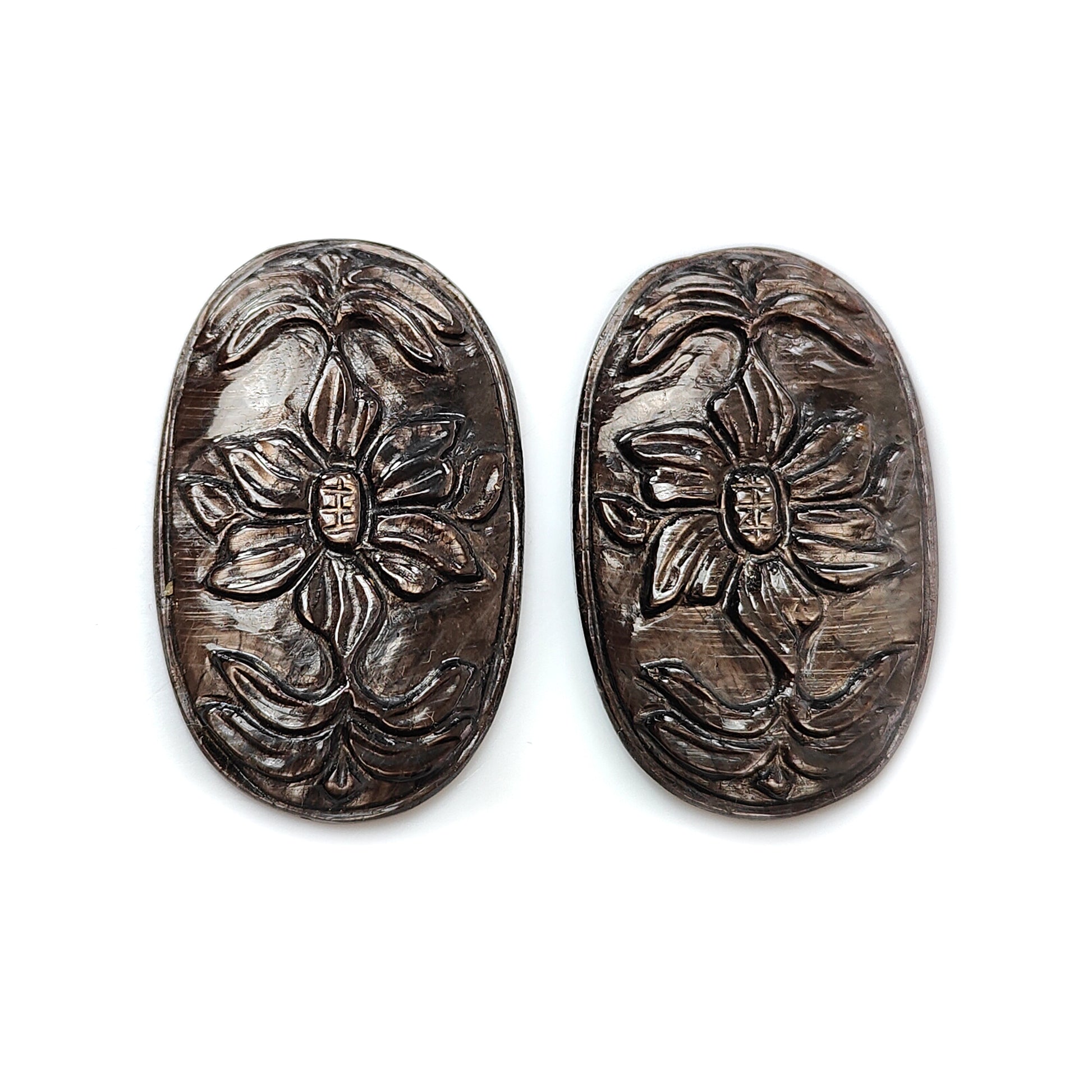 golden chocolate sapphire oval carving