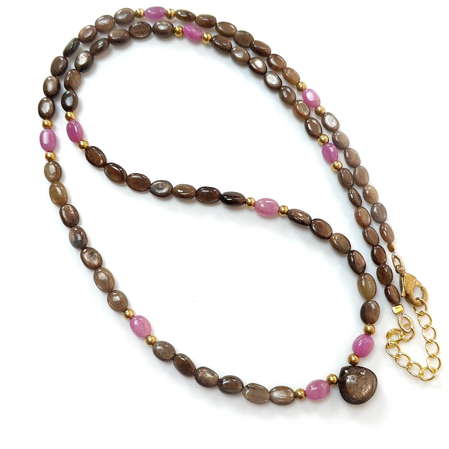 Golden & Pink Sapphire Oval Plain Brass Necklace: 18.04gms Golden & Pink Sapphire Oval Plain Brass Necklace 5*4mm-7*5mm ,10mm 21"( Apx)