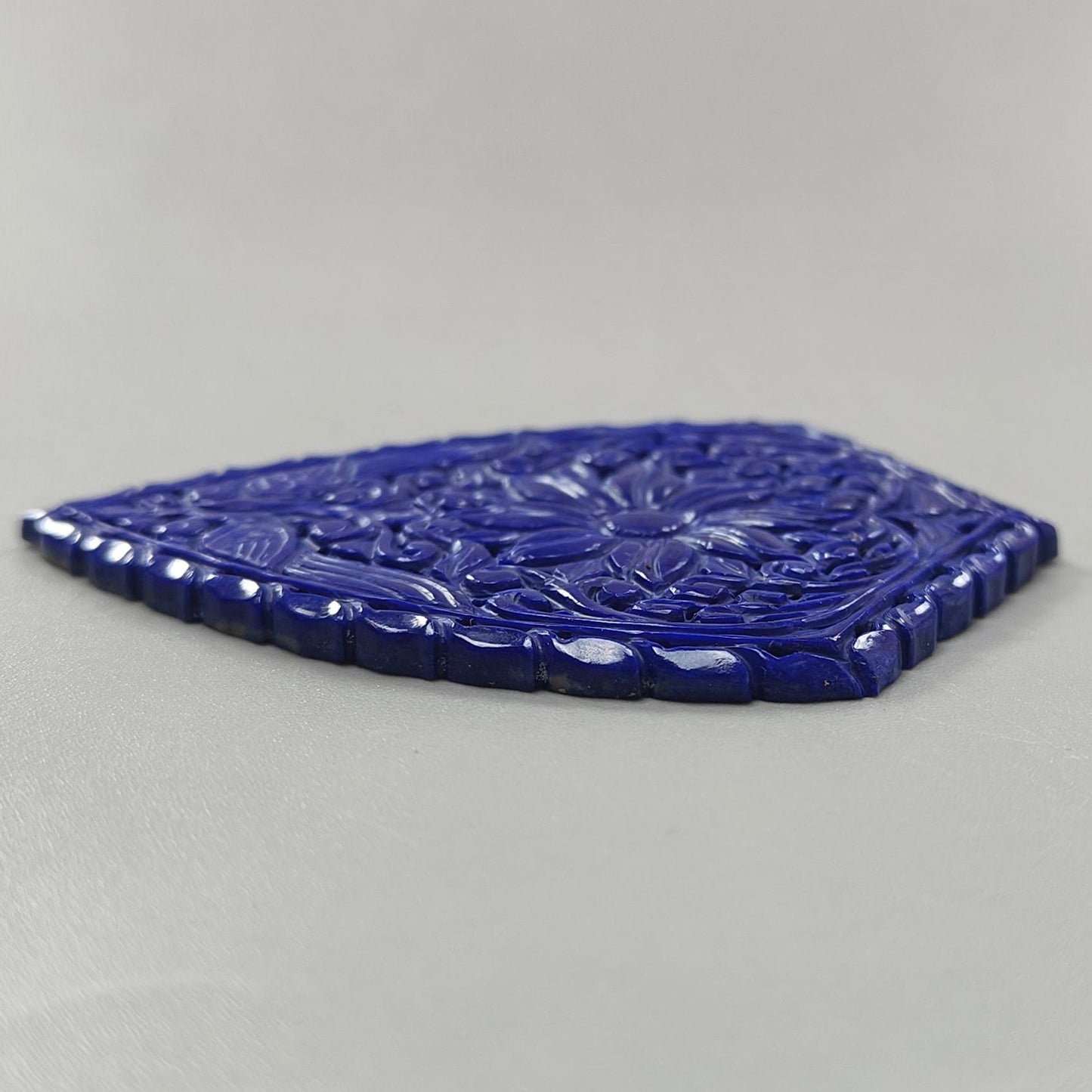 141.00cts Untreated Lapis Lazuli Hand Carved Fancy Shape 80*58mm