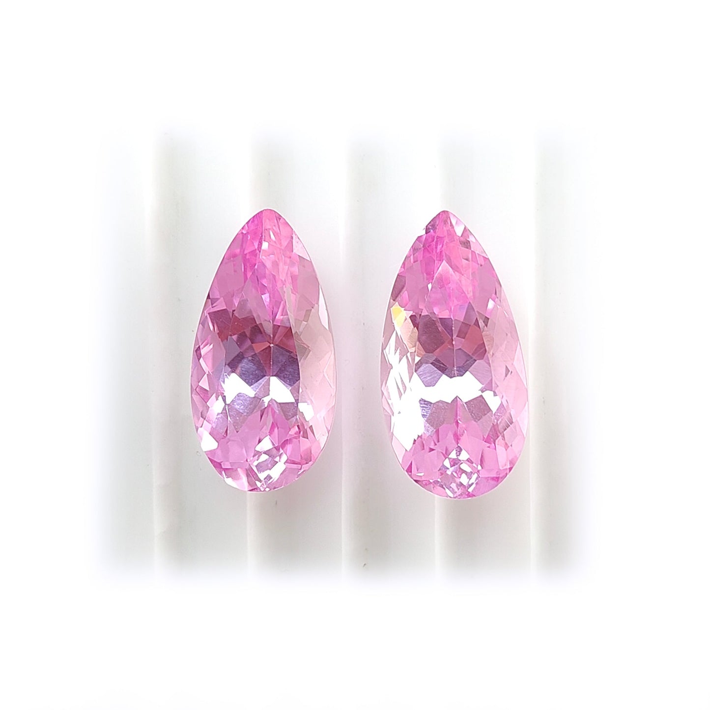 synthetic Morganite pear shaped faceted cut