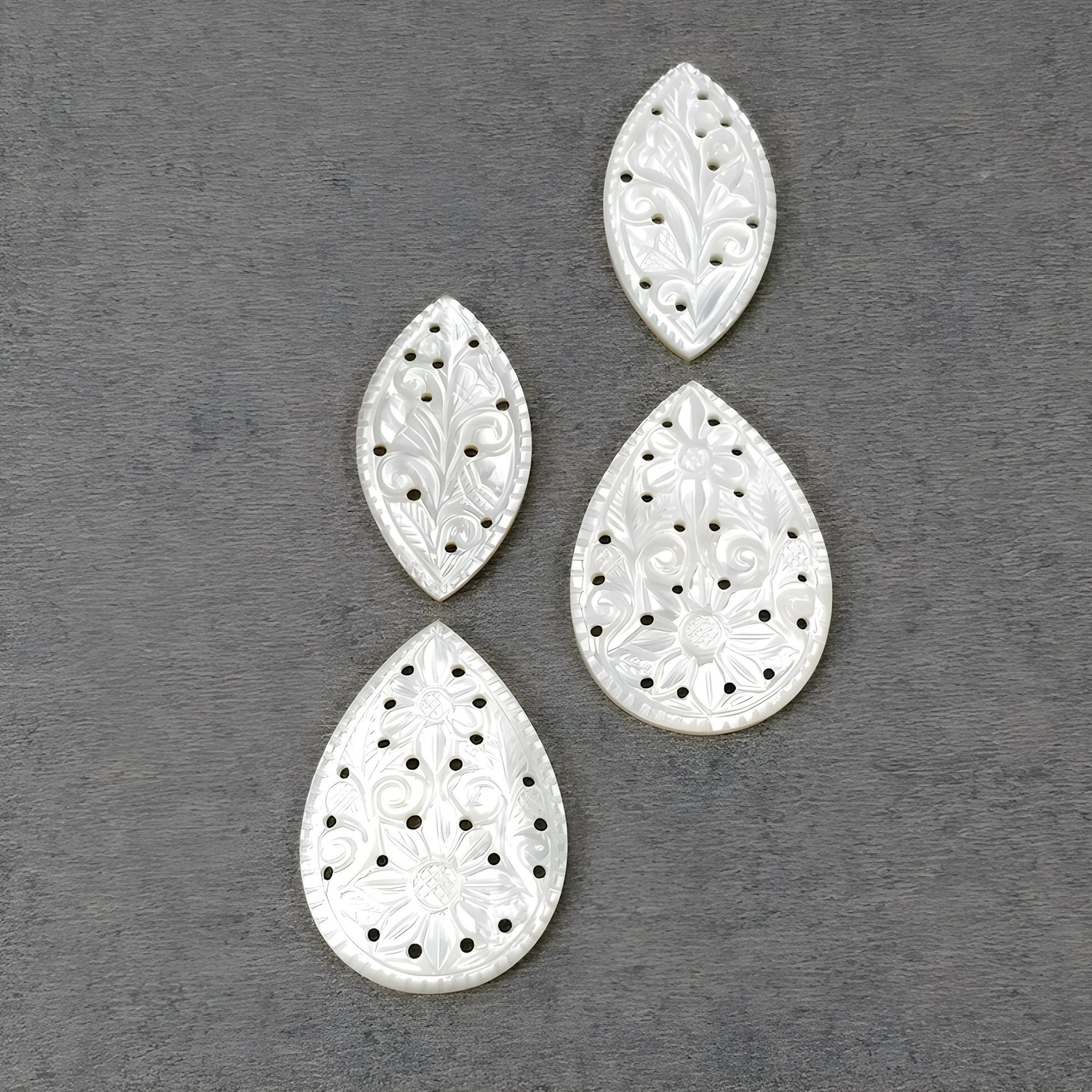 mother of pearl marquise, oval carving