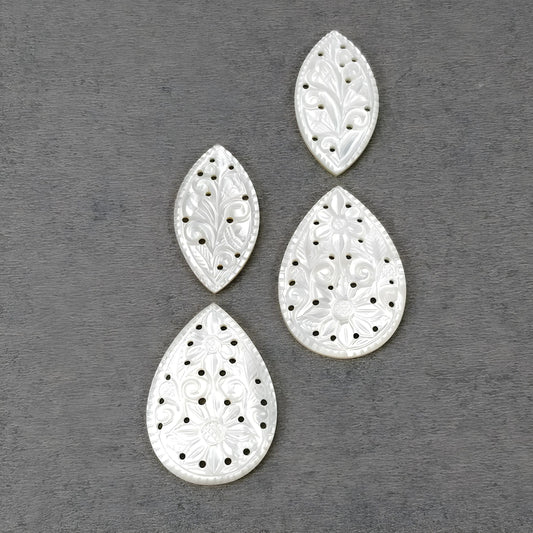 mother of pearl marquise, oval carving