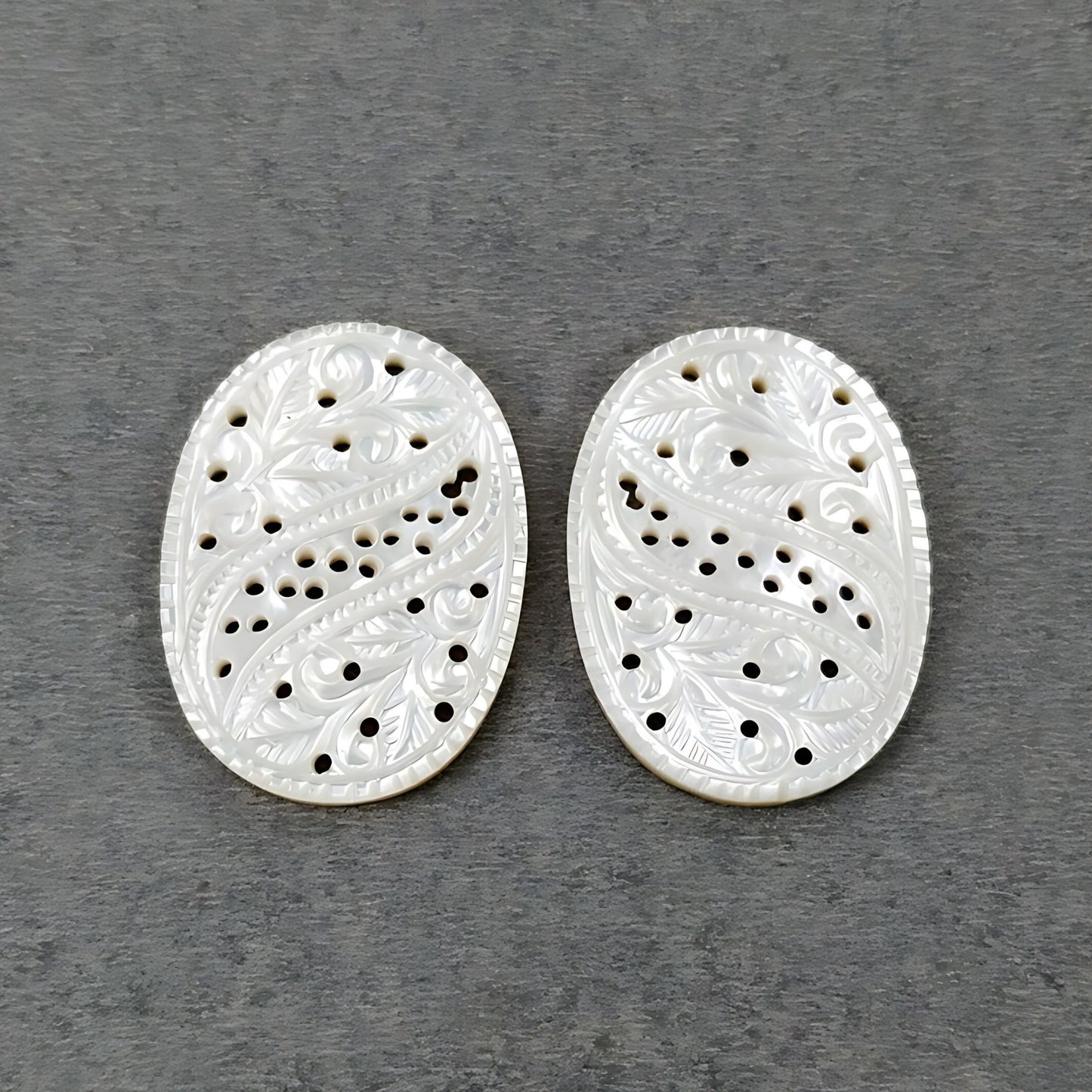 mother of pearl oval carving