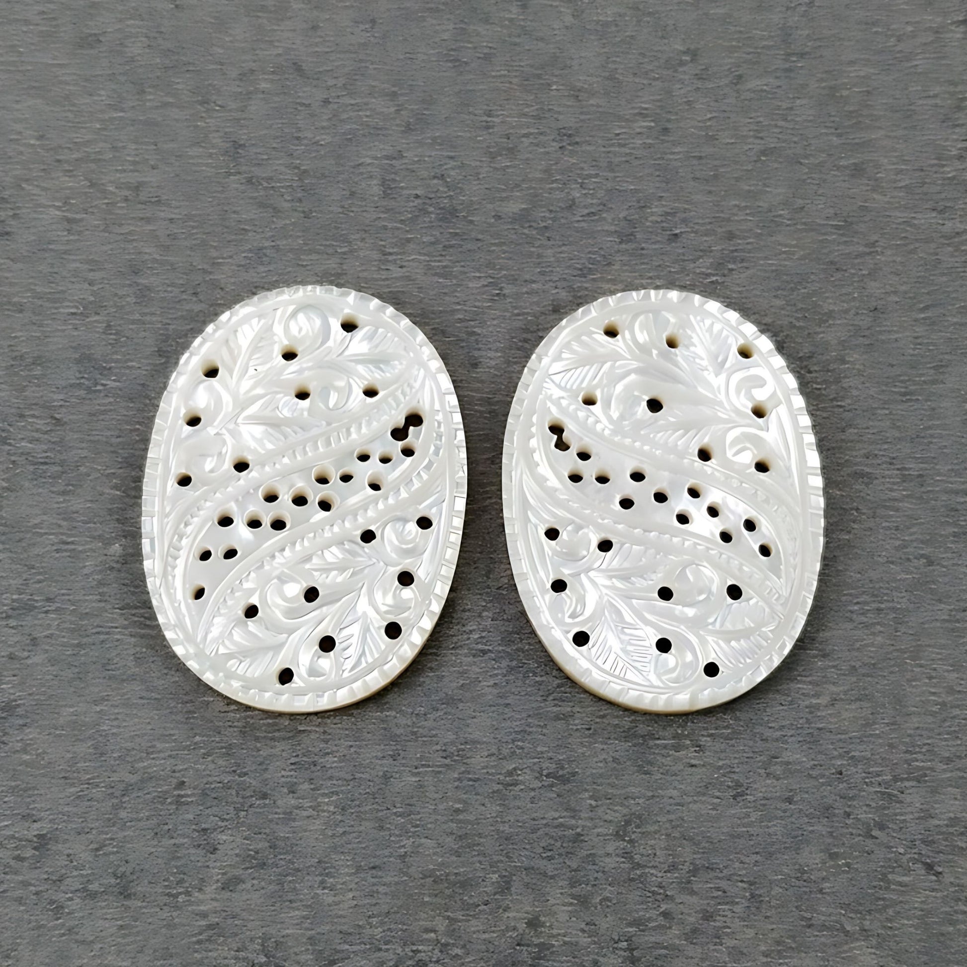 mother of pearl oval carving