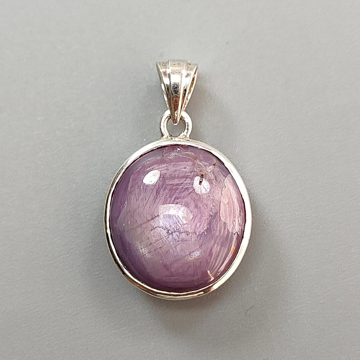Star Ruby Silver Pendant: 5.62gms Natural Untreated Both Side Star Ruby Oval Plain Briolette 925 Sterling Silver Bezel Set Pendant 1.10"