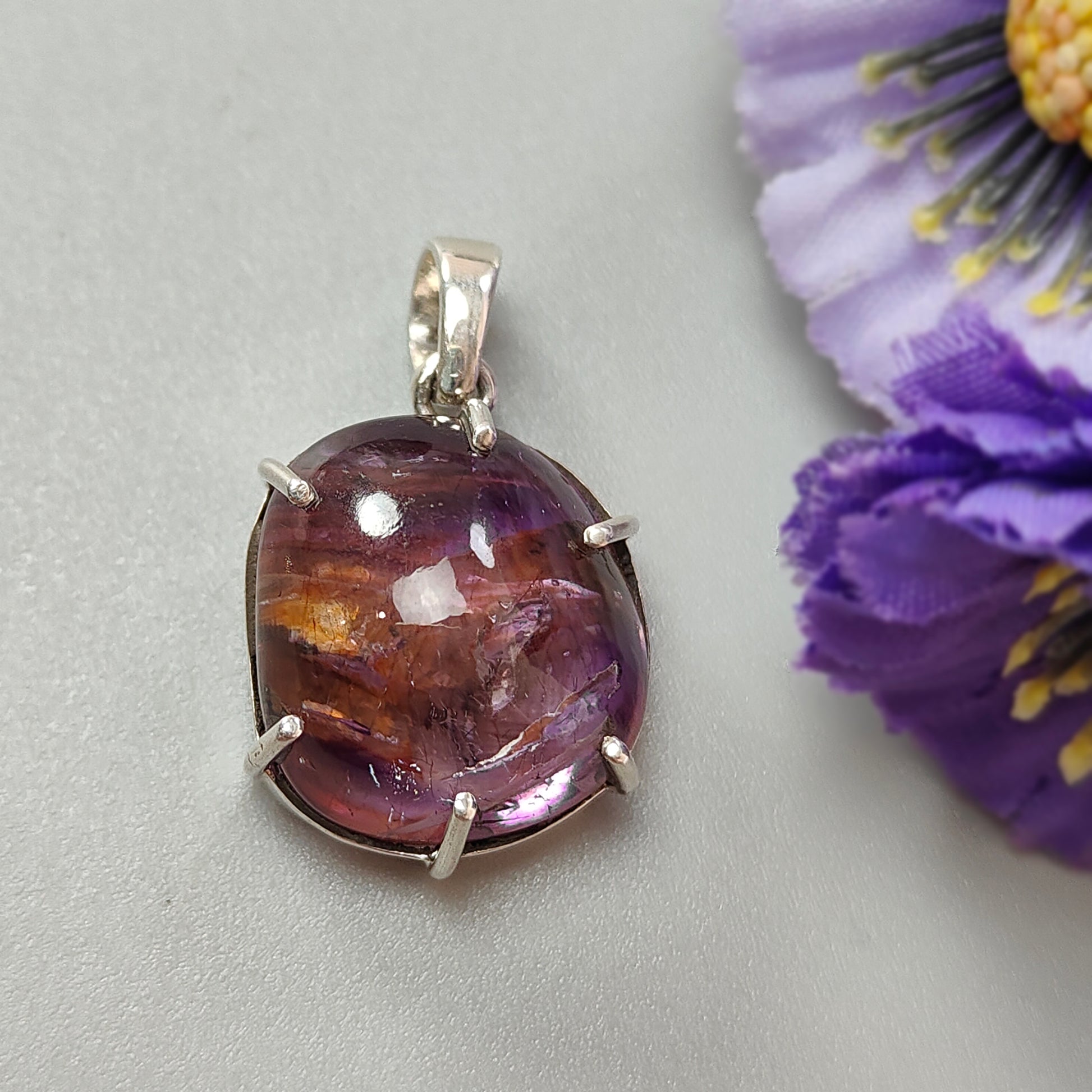 Purple pendant with silver setting