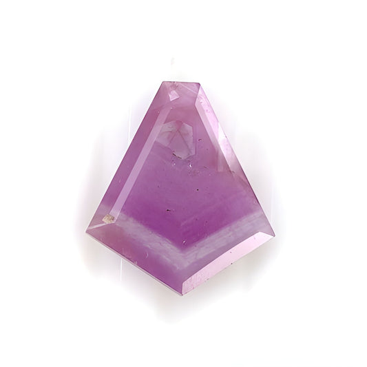 ruby uneven shape faceted cut