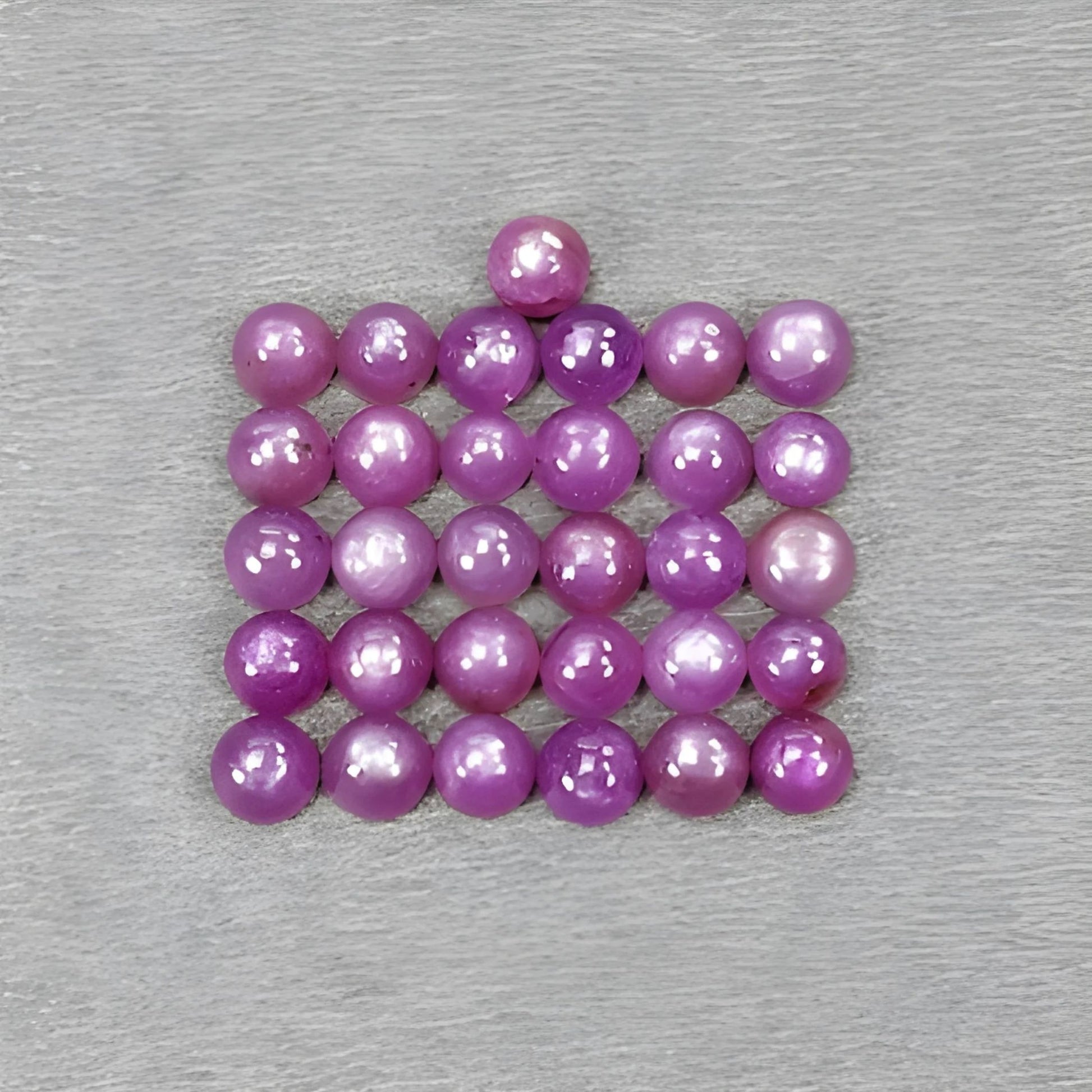 ピンクサファイアのラウンドカボション