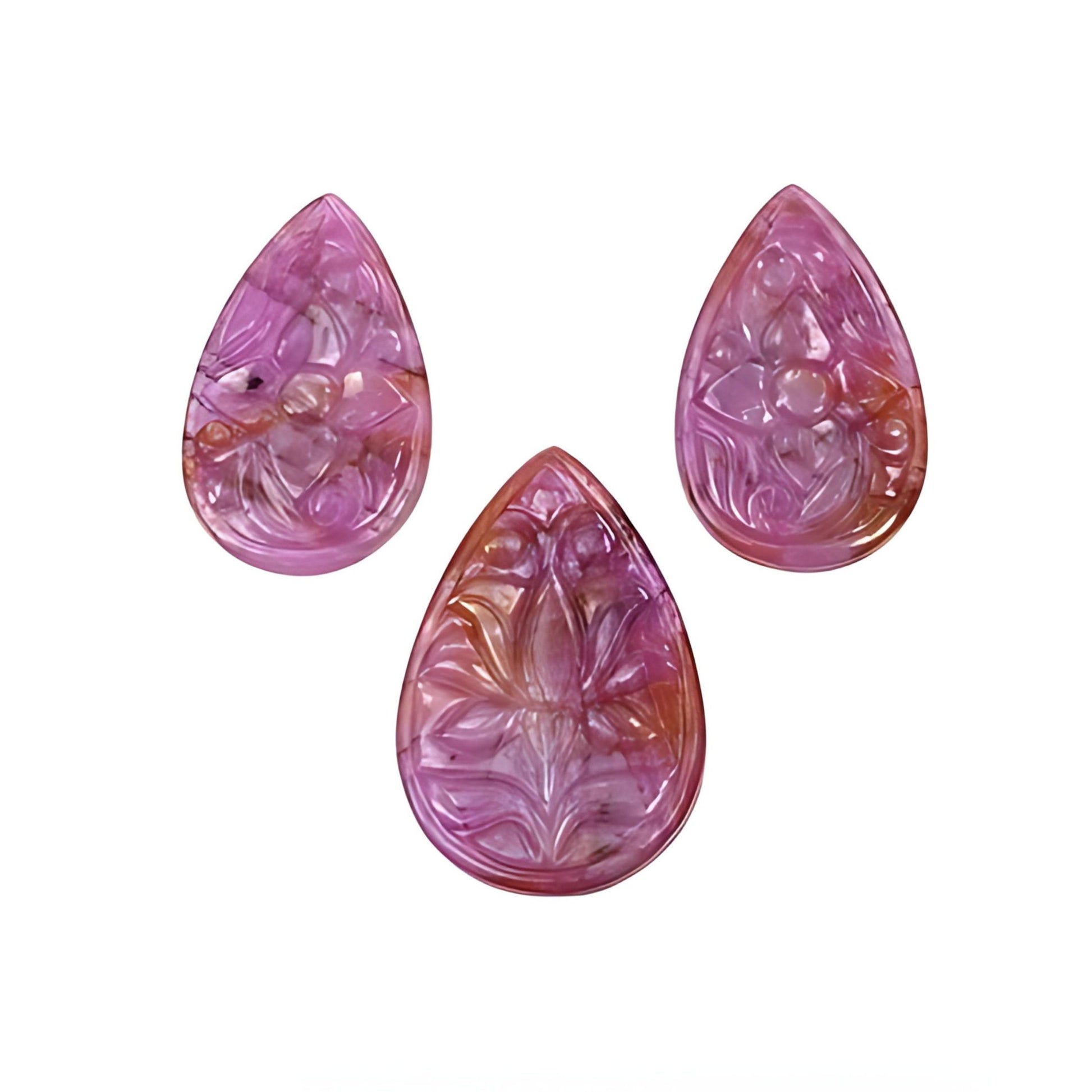 pink sapphire pear shape carving