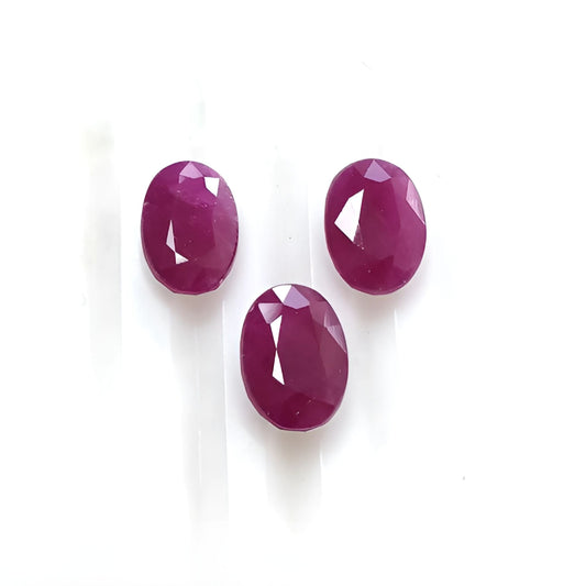 red ruby oval faceted cut