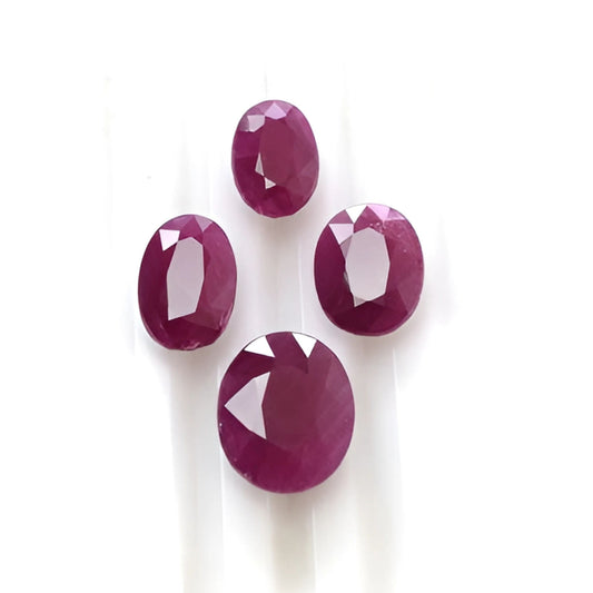 red ruby oval faceted cut