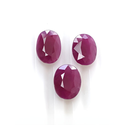 red ruby oval faceted cut