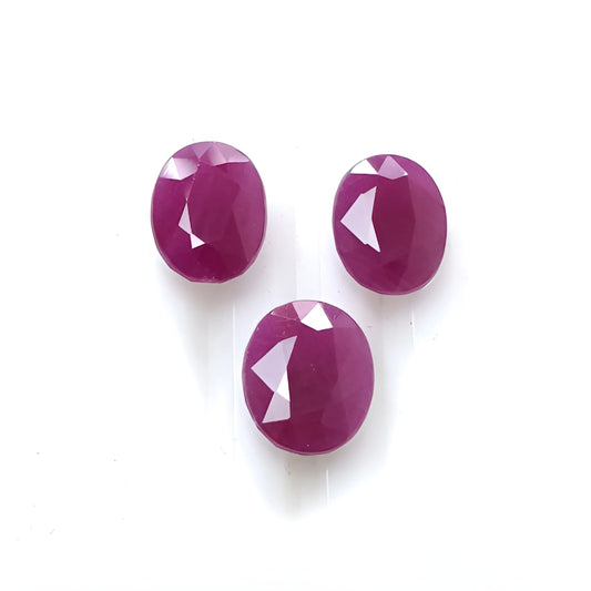 red ruby oval faceted cut