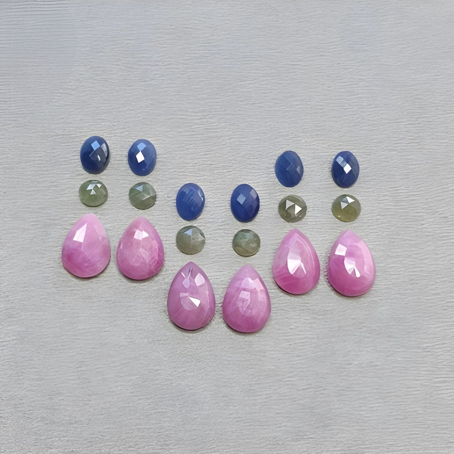 红宝石，多颗蓝宝石梨形玫瑰切割