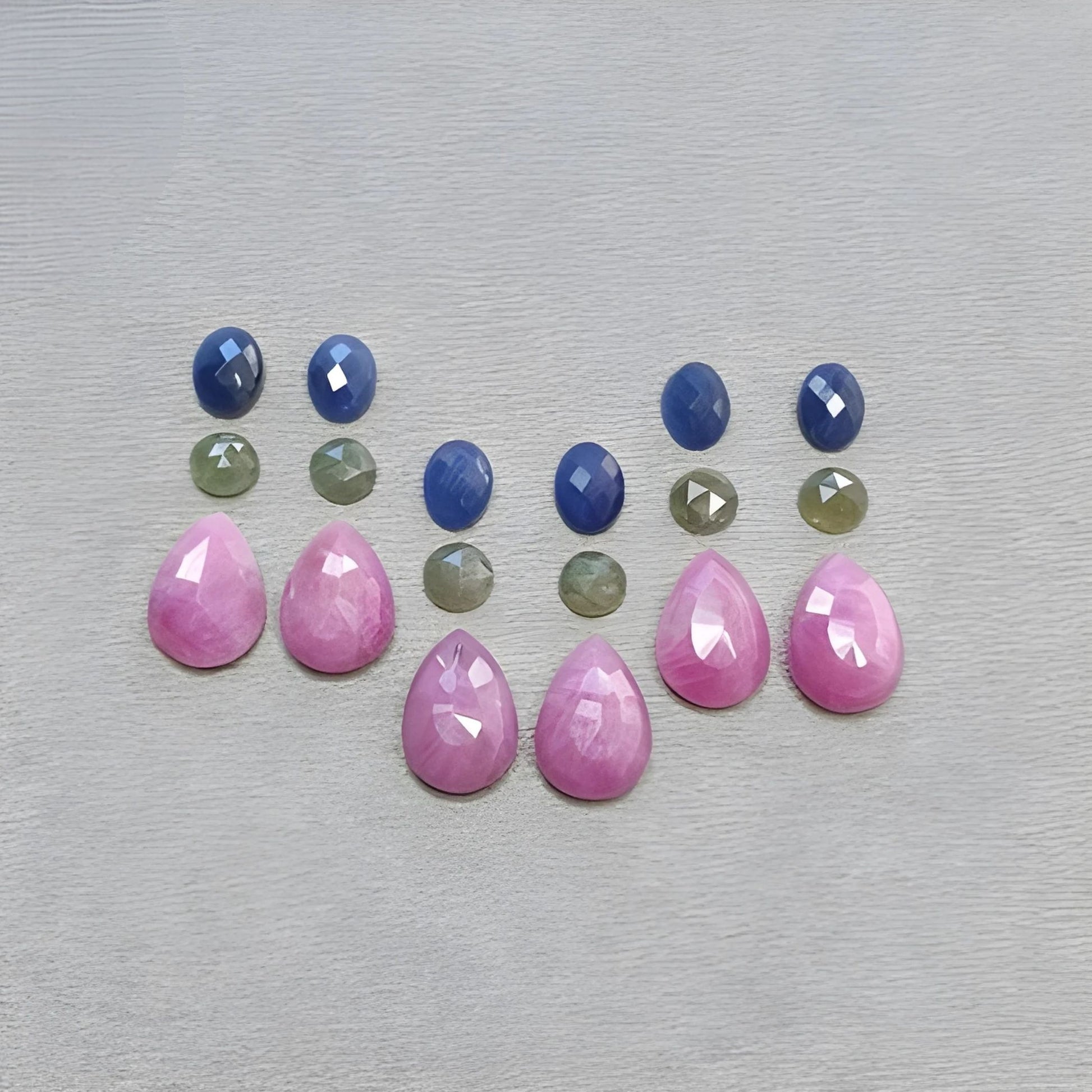 红宝石，多颗蓝宝石梨形玫瑰切割