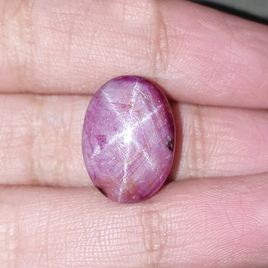 red star ruby oval cabochon