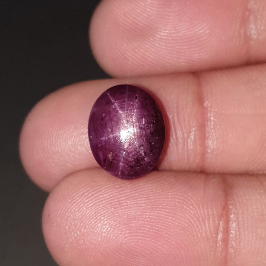 red star ruby oval cabochon
