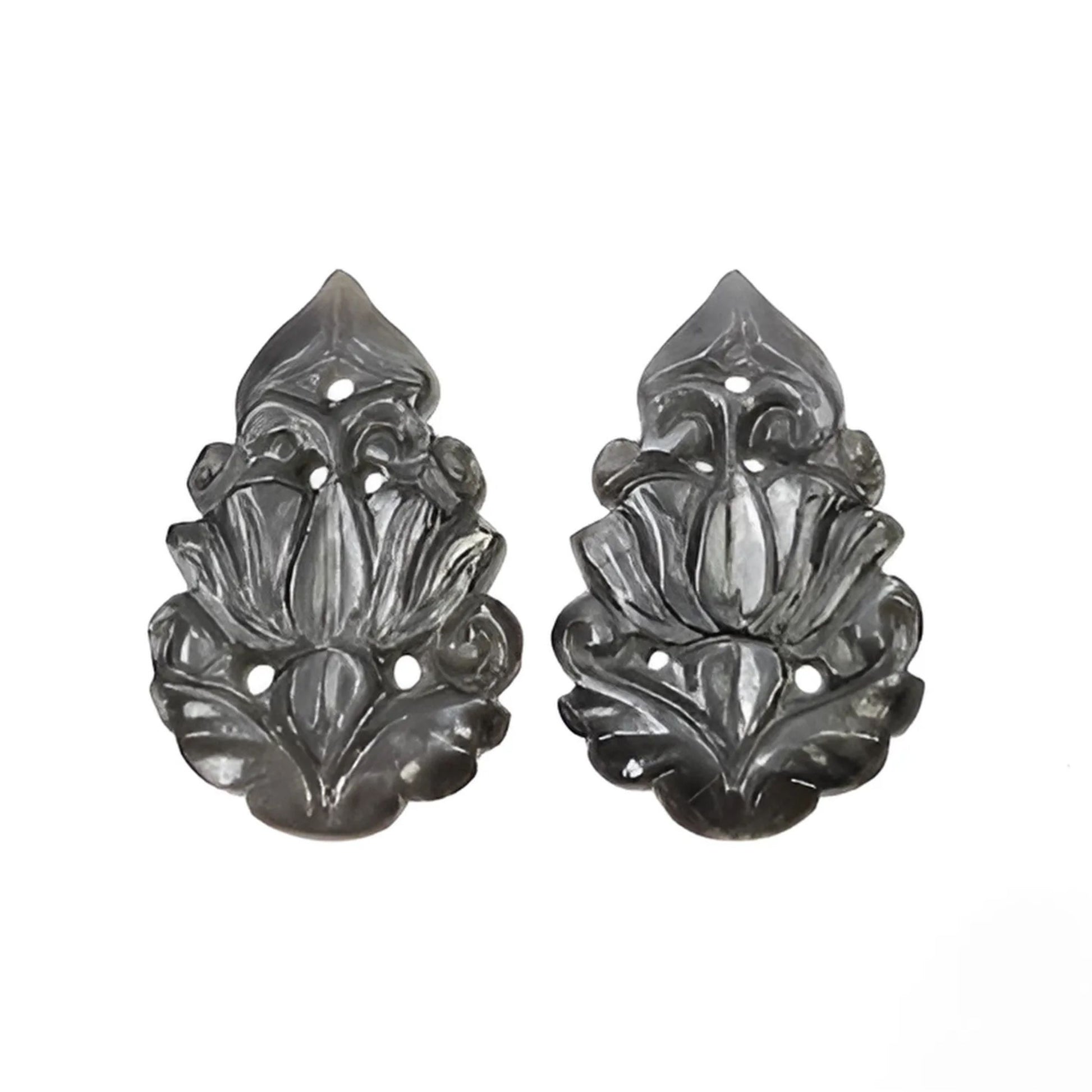 silver sapphire pear shape carving