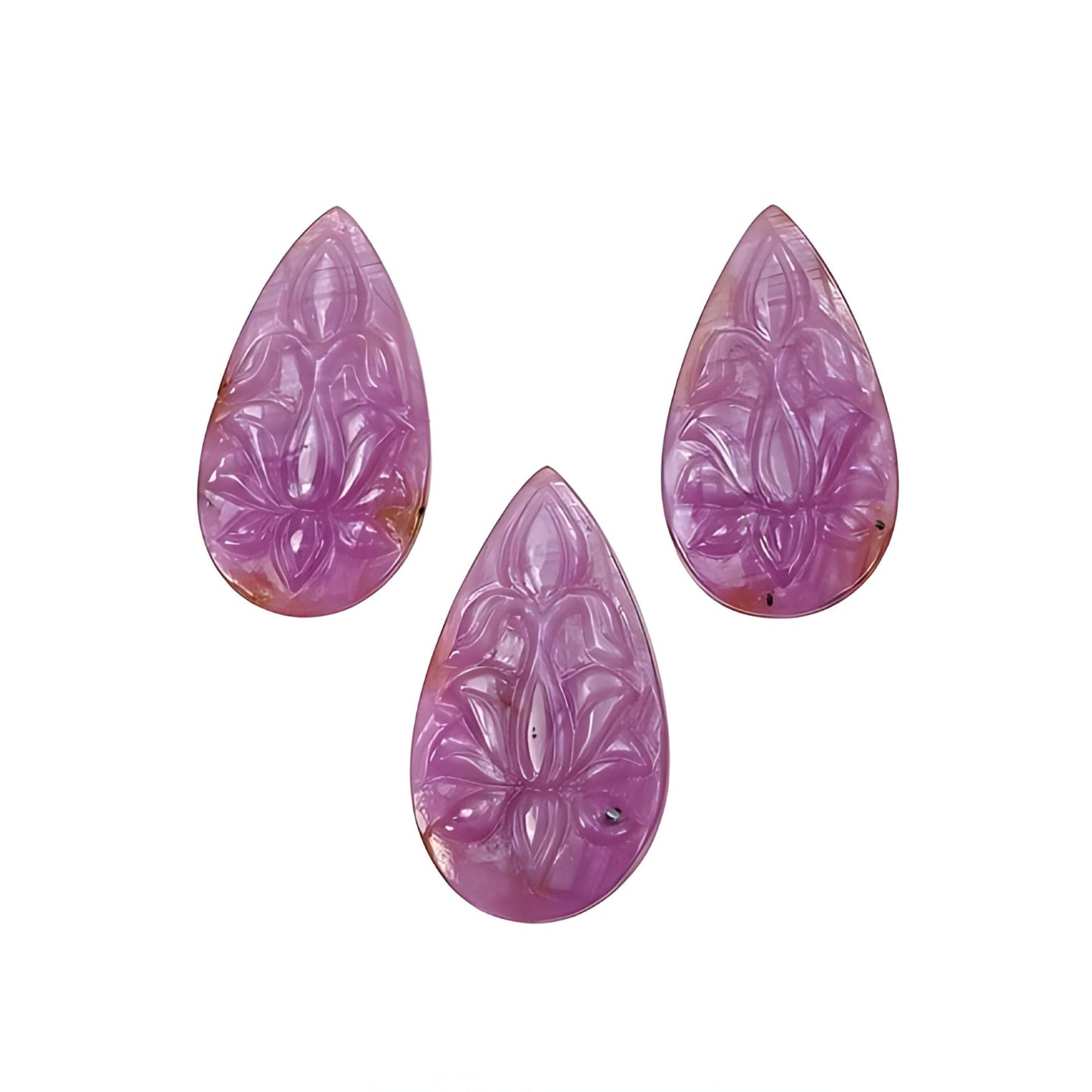 pink sapphire pear shape carving