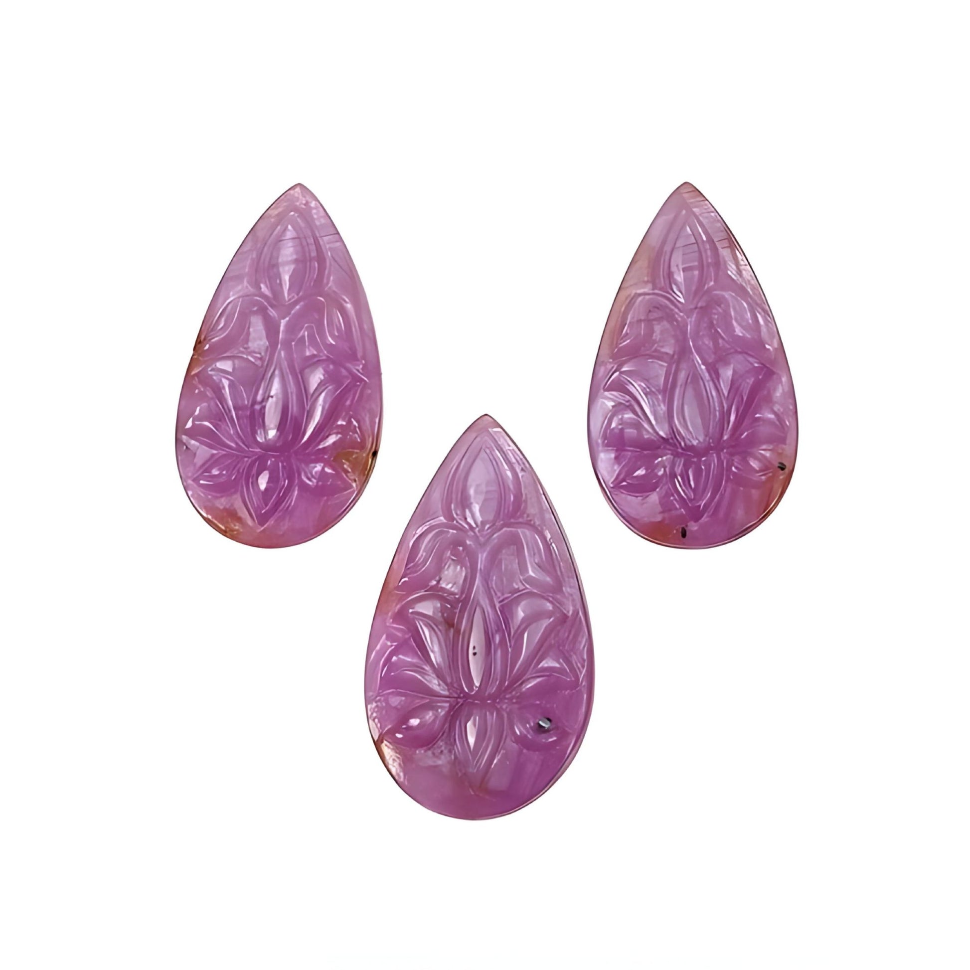 pink sapphire pear shape carving
